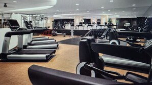 A gym with treadmills, stationary bikes, and weight machines. - Steps from the Las Vegas Strip Perfect Condo for National Rodeo Finals Event (Las Vegas)
