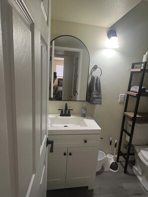 Hair dryer, towels, soap, toilet paper