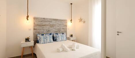 2 bedrooms, iron/ironing board, travel crib, internet