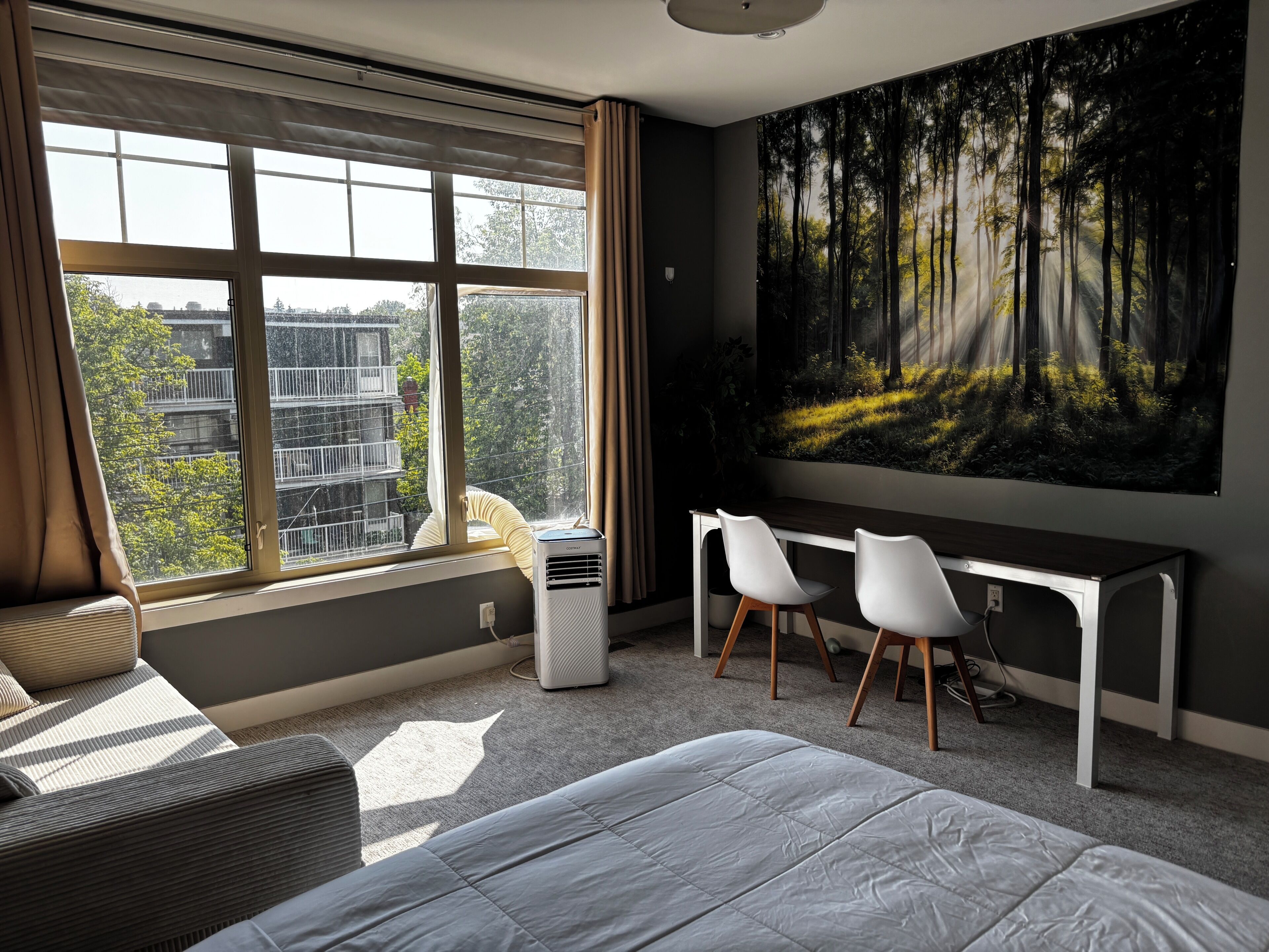 Luxe vierpersoonskamer, uitzicht op de stad