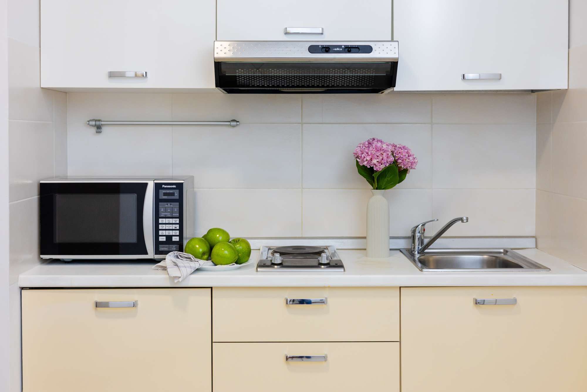 Fridge, microwave, stovetop, cookware/dishes/utensils