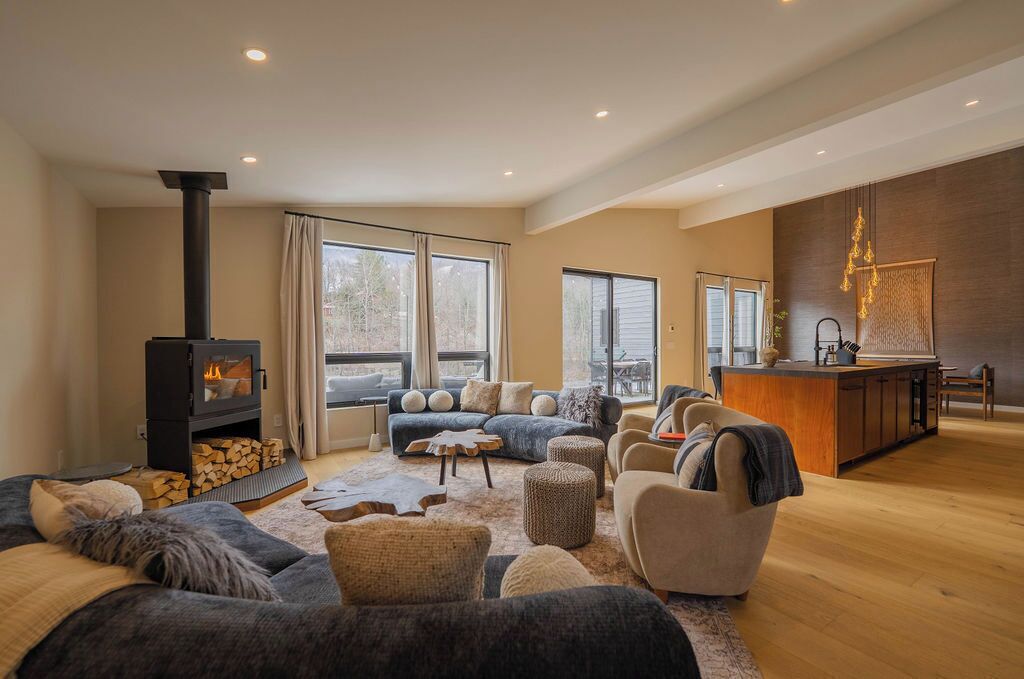 Light-filled living room with mountain views and comfortable seating for your entire group.