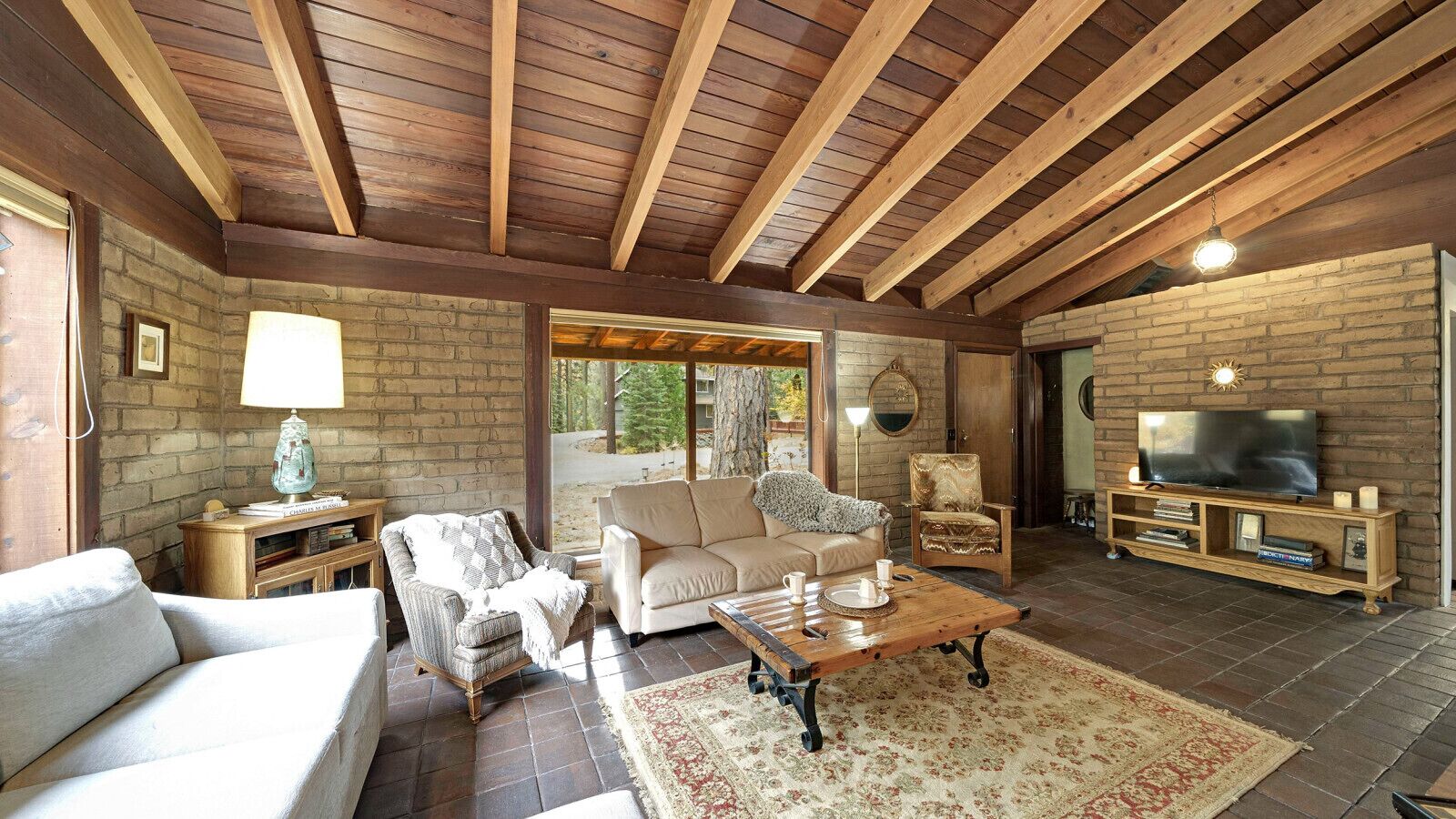 TV, fireplace, books