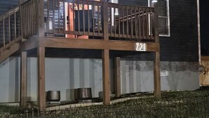 A two-story house with a wooden deck and a visible number '721'. - ★ Superhost Rated ★ Lily of the Valley Retreat - Steps to Downtown (Kingsport)