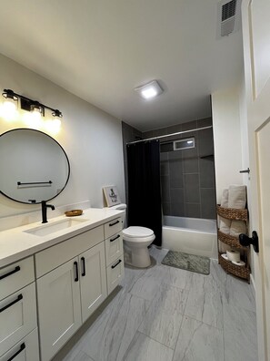 Shower, towels, toilet paper