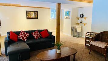 Smart TV, fireplace, foosball, books