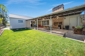 Outdoor dining - Family Fun Retro Vibe! Spacious & Charming w/Games, Firepit, & Fenced Yard! (Price)