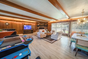 Game room - Family Fun Retro Vibe! Spacious & Charming w/Games, Firepit, & Fenced Yard! (Price)