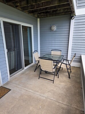 Outdoor dining - Charming 1 bedroom, 1 bathroom condo with spacious kitchen and walkout patio (Spring Lake)
