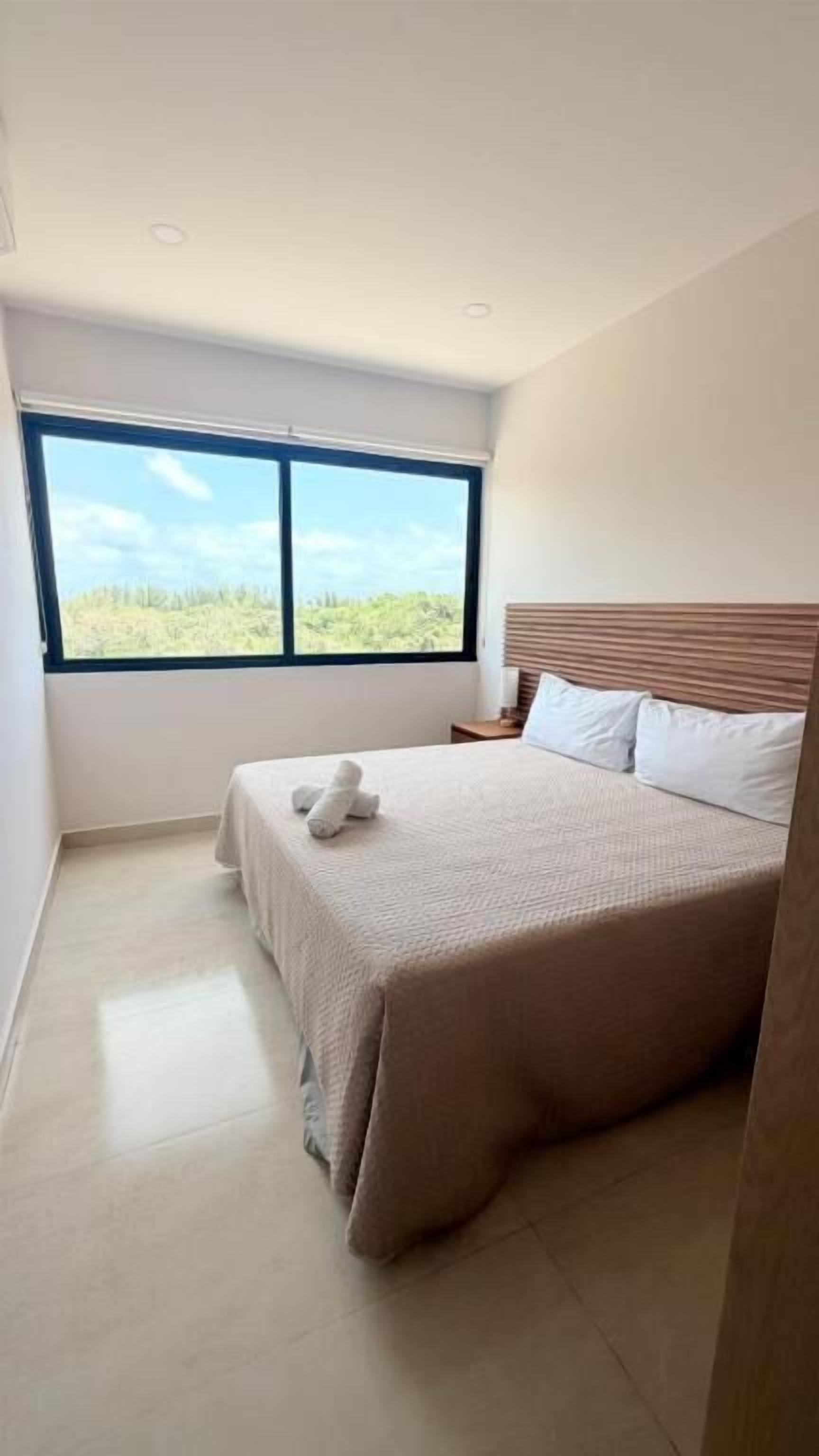 Apartamento família, 2 quartos, sacada, vista para a cidade | Wi-Fi de cortesia, roupa de cama