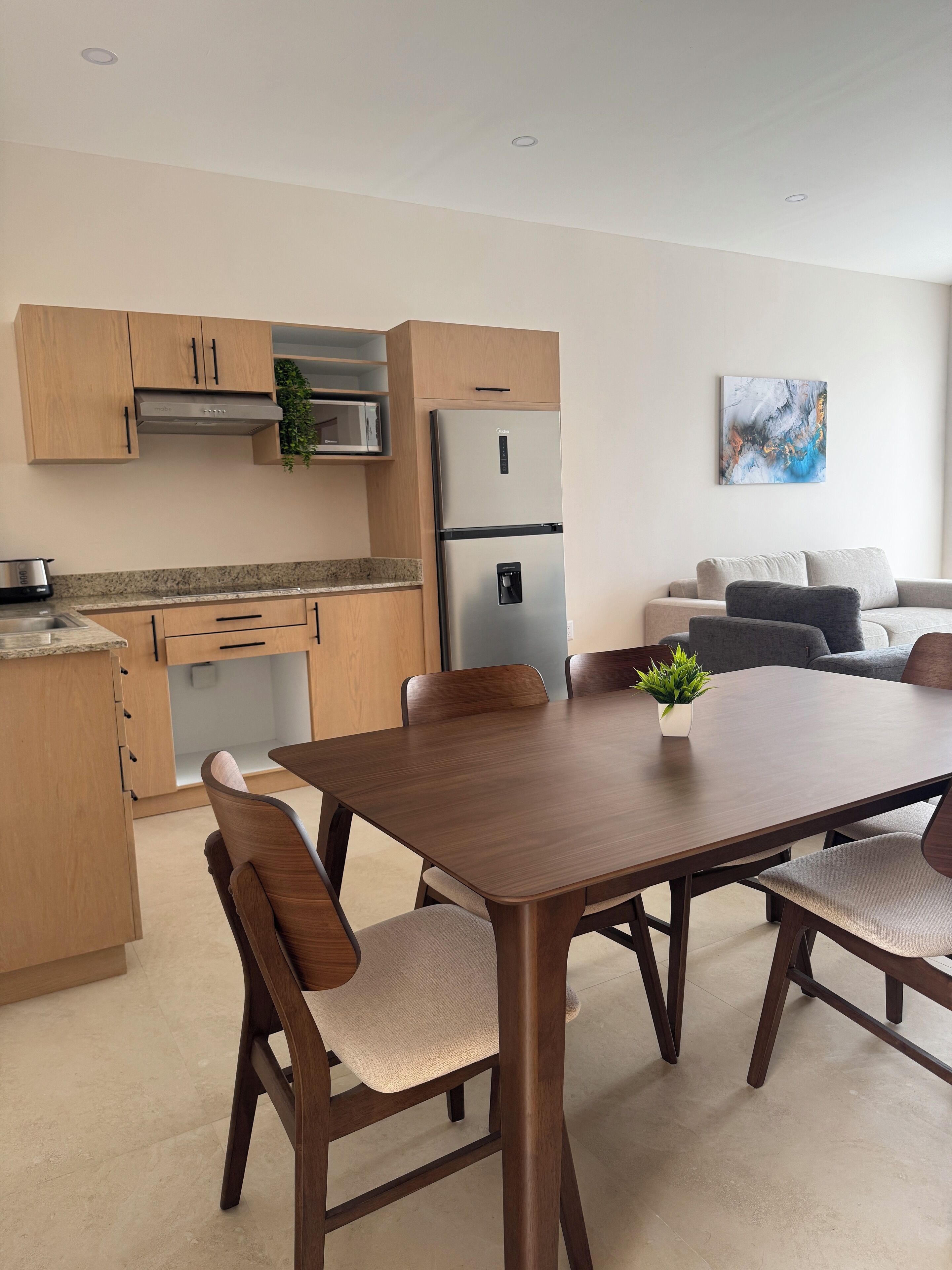 Full-size fridge, microwave, oven, cookware/dishes/utensils