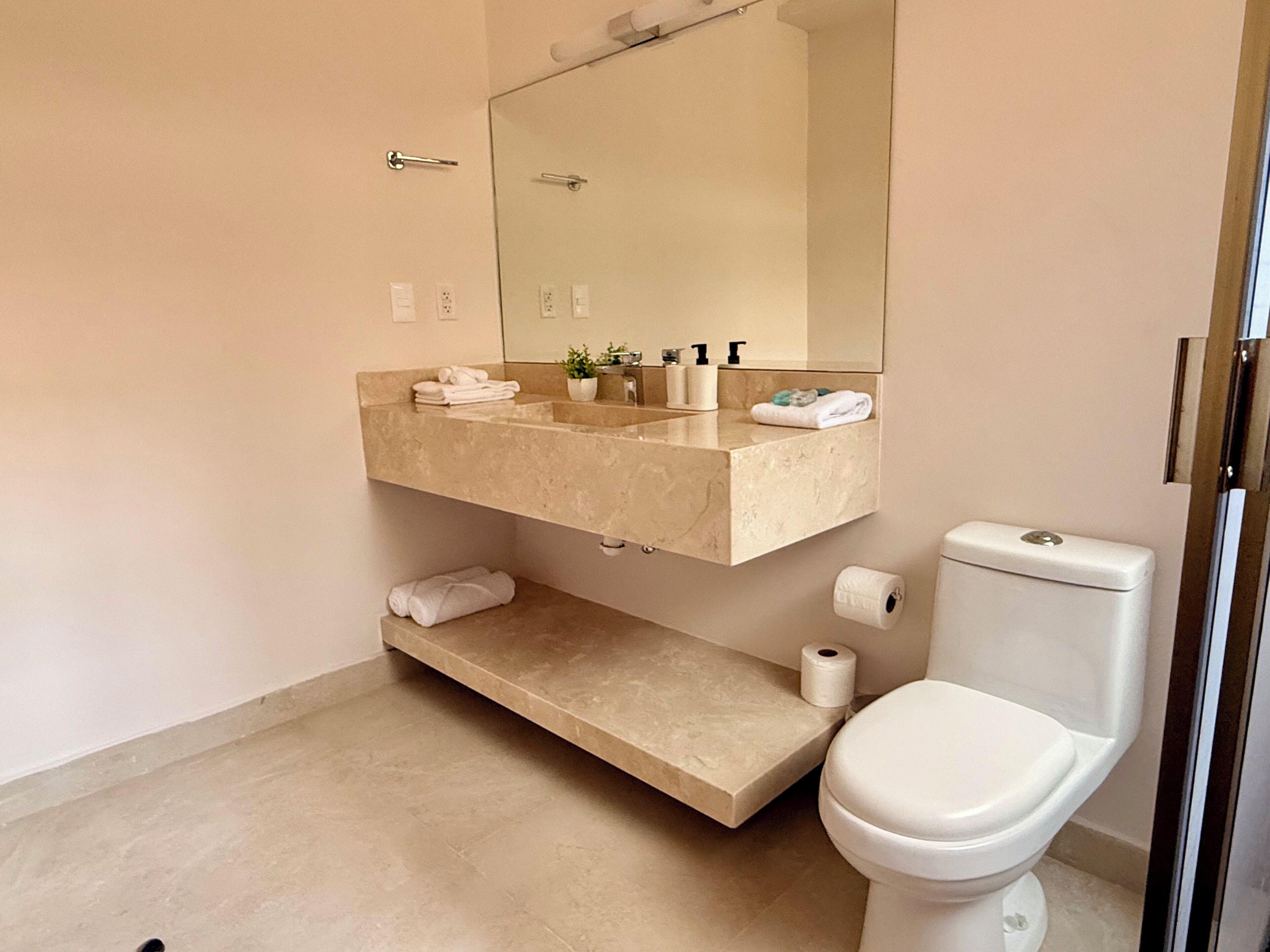 Shower, towels, soap, shampoo