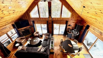 Smart TV, fireplace, foosball, books