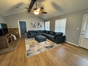 TV, fireplace - Spacious 3BR Home Near I-45 — Perfect for Families! “Cozy Getaway" (Conroe)