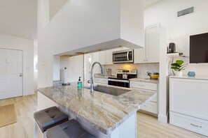 Fridge, microwave, oven, stovetop - Cape Canaveral Beachside Condo W/ Private Balcony, Pool & Pets Welcome!  🌴🐾 (Cape Canaveral)