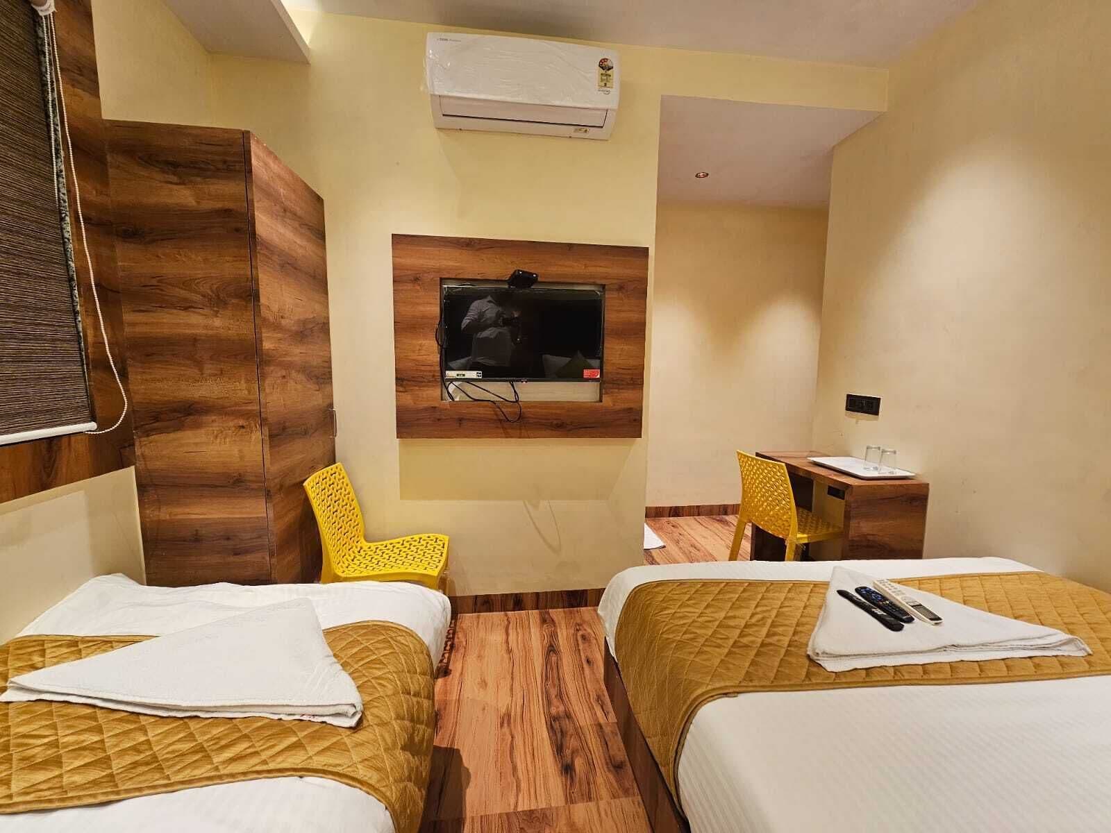 Kahden hengen deluxe-huone (kaksi sänkyä), 2 yhden hengen sänkyä | Ilmainen Wi-Fi, vuodevaatteet