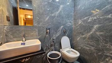 Shower, towels, soap, shampoo