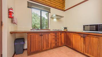 Cottage, Multiple Beds, Patio, Garden View | Private kitchen | Full-sized fridge, stovetop, cookware/dishes/utensils