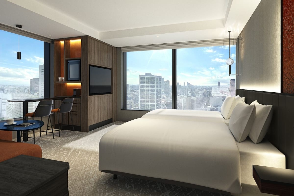 Deluxe Corner Twin, Non Smoking | Premium bedding, down comforters, in-room safe, desk