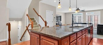 Luxury 4-bedroom townhome with fitness room and AC in charming Gaithersburg