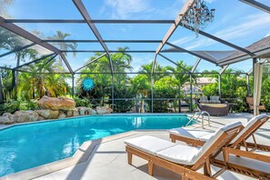 Outdoor pool, a heated pool - Luxe Canal Sunset Paradise (Cape Coral)