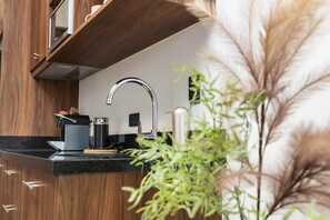Fridge, microwave, stovetop, toaster - Chic Condo • Rooftop Pool • Heart of Playa (Playa del Carmen)