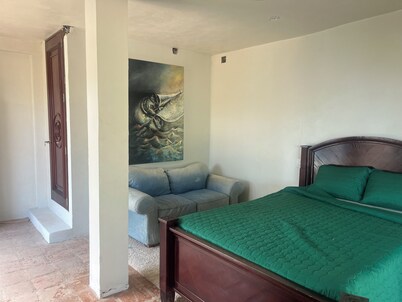 The "Chiclayo Suit" has a terrace that ends in the beach, and facing the pool.