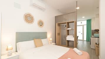 Ferros/tábuas de passar roupa, acesso à internet, roupa de cama