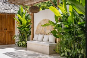 Deluxe Villa, 1 King Bed, Patio, Pool View | Living area | 43-inch TV with cable channels - MaÏa Villa Bingin (Pecatu)