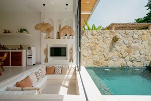 Deluxe Villa, 1 King Bed, Patio, Pool View | Living room | 43-inch TV with cable channels - MaÏa Villa Bingin (Pecatu)