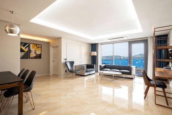 Ocean Suite Twin Room | Wohnbereich | Fernseher