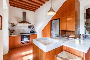 A modern kitchen with a built-in oven, a microwave, and a stainless steel refrigerator. - Villa Salivolpe Amazing Chianti View 8, San Casciano VDP, Italy (San Casciano VDP)