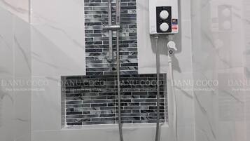 Shower, free toiletries, hair dryer, towels