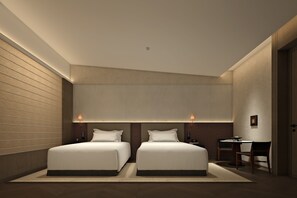 أغطية فراش متميزة وألحفة محشوة بالريش وعناصر مجانية داخل الميني بار