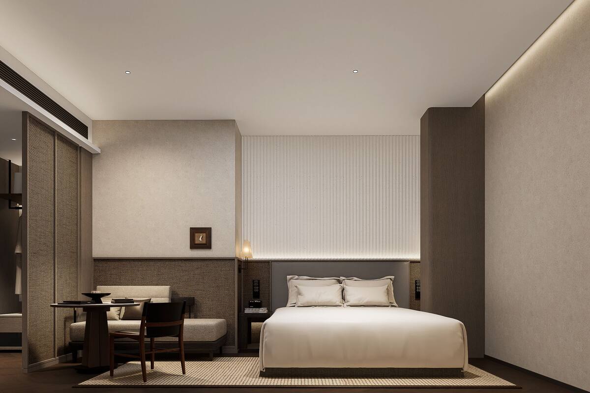 Premium bedding, down comforters, free minibar, in-room safe