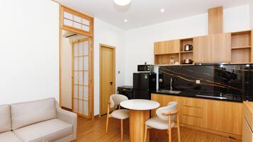 Deluxe Apartment, 1 Bedroom, Balcony, City View | Private kitchen | Fridge, microwave, stovetop, rice cooker