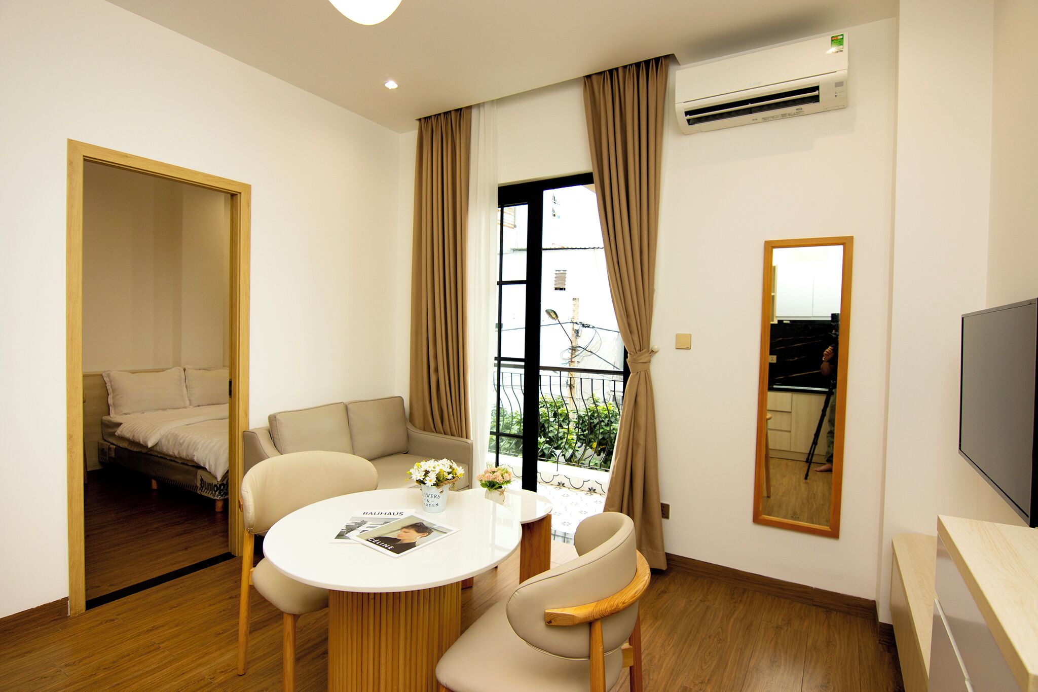 Deluxe Apartment, 1 Bedroom, Balcony, Courtyard View | Living area | 45-inch flat-screen TV with cable channels