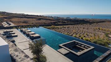 Indoor pool, outdoor pool, pool umbrellas, sun loungers