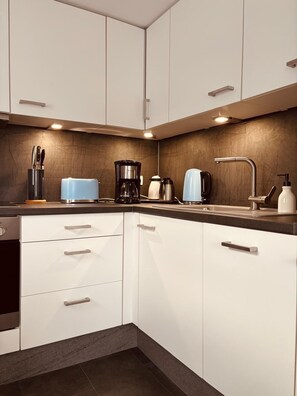 Placa de cuina i rentaplats 