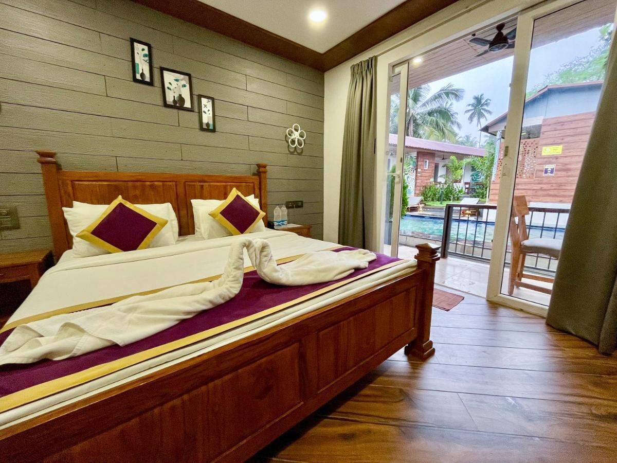 Deluxe Cottage, Balcony, Pool View | Free WiFi