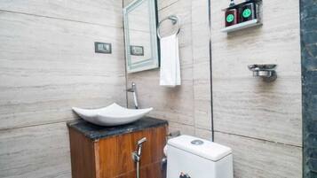 Deluxe Cottage, Balcony, Pool View | Bathroom | Shower, free toiletries, towels, soap