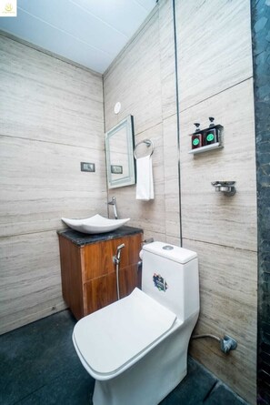 Deluxe Cottage, Balcony, Pool View | Bathroom | Shower, free toiletries, towels, soap