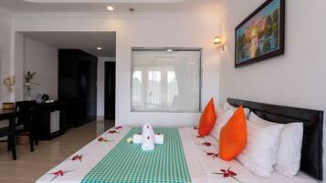 Deluxe Double Room, Balcony, City View | Minibar, in-room safe, desk, free WiFi