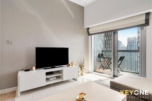 Deluxe Apartment, Sea View | Living area | TV - Cayan Escape Lavish 1BR with Sea View  (Dubai)