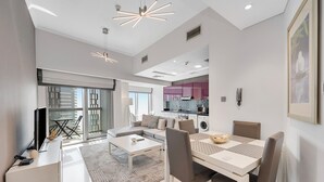 Deluxe Apartment, Sea View | Living area | TV - Cayan Escape Lavish 1BR with Sea View  (Dubai)
