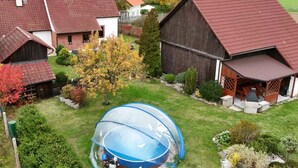 A rural property with multiple barns, a fenced-in trampoline area, and a well-maintained lawn. - Rabštejn by Interhome (Zihle)