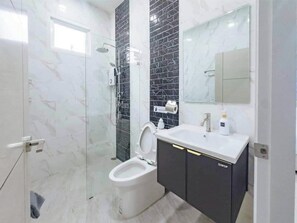 Shower, hair dryer, towels, soap