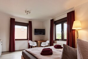 1 slaapkamer, een strijkplank/strijkijzer, gratis wifi, beddengoed