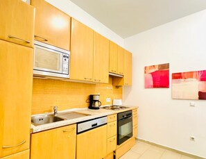 Appartamento Basic | Cucina privata | Microonde, forno, piano cottura, lavastoviglie