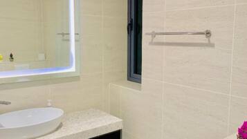 Shower, slippers, towels, soap